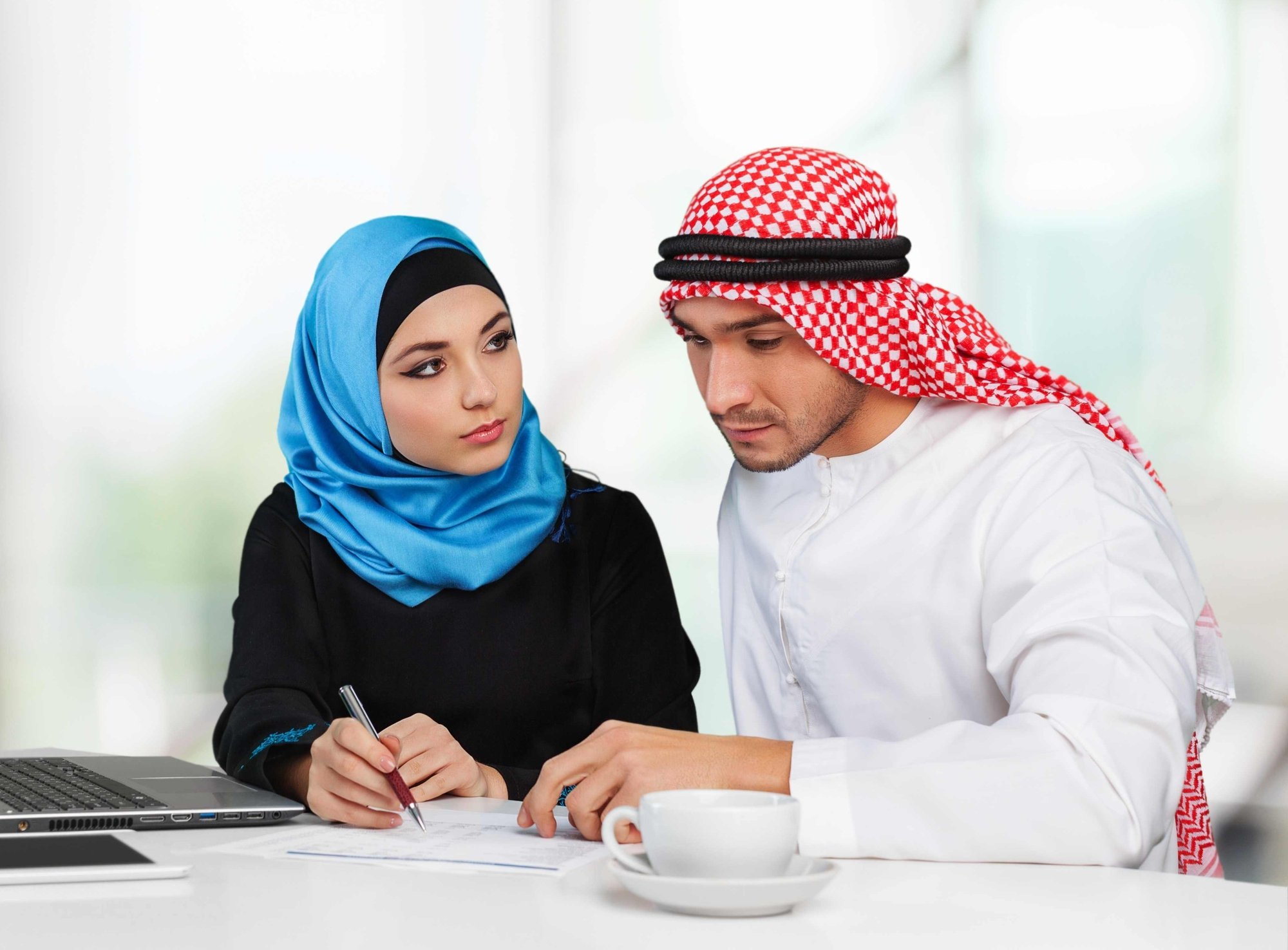 Business meeting with Middle East man and woman